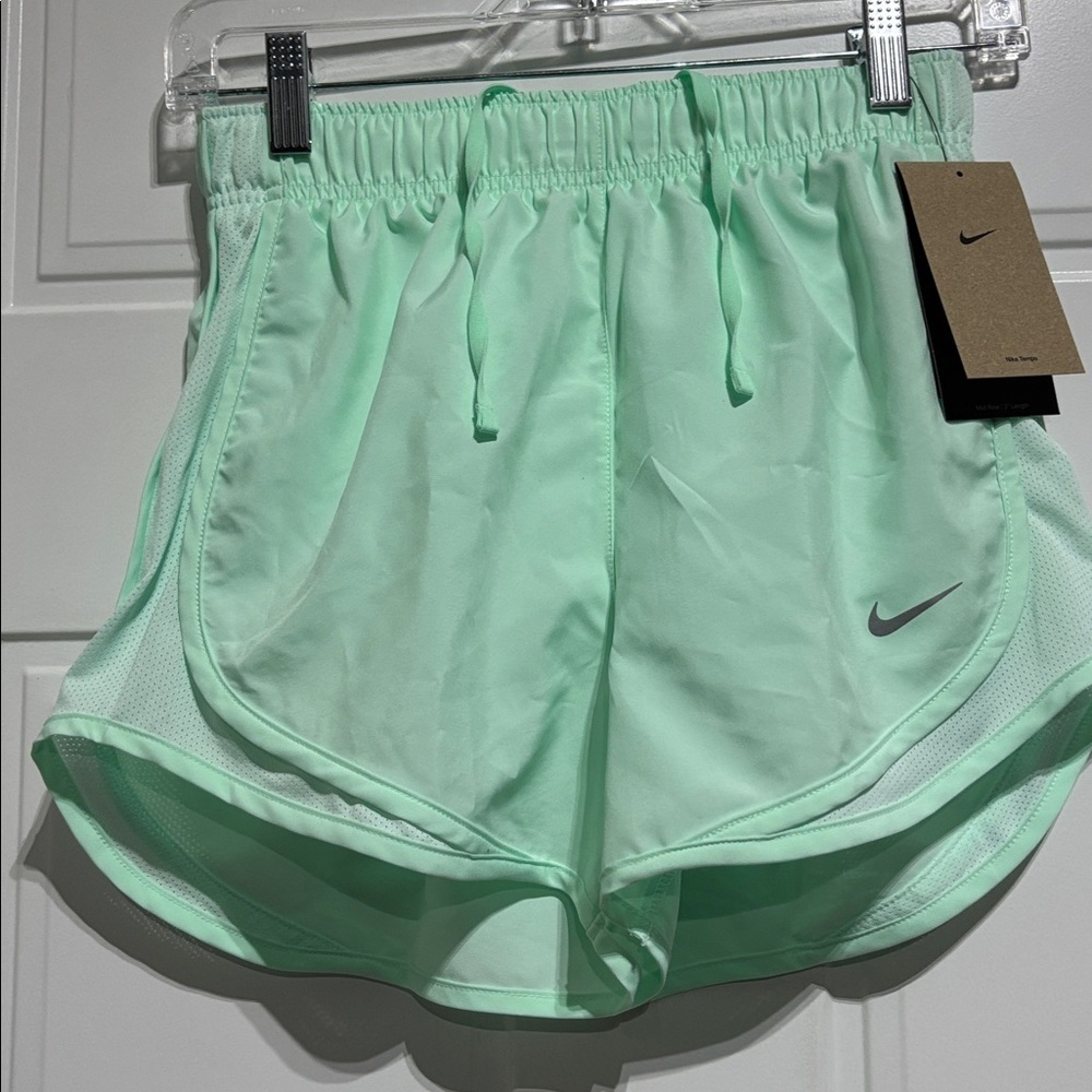Nike Mid Rise 3” length,panty lined,mesh panel elastic drawcord waist, running